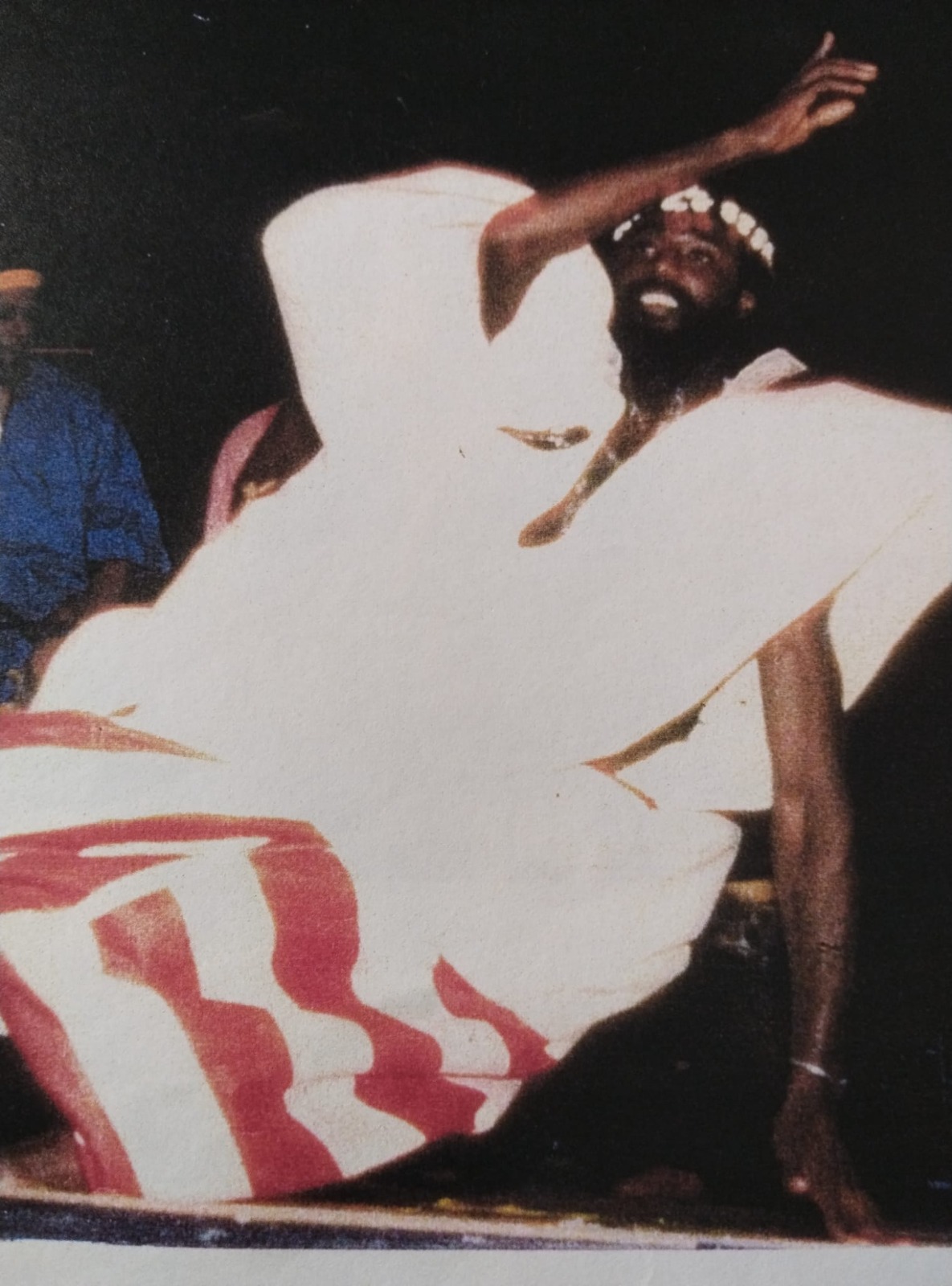 A captivating scene of a dancer in motion, surrounded by vibrant colors and flowing paint strokes, showcasing the fluidity between dancing and painting. The background features an ethereal realm, symbolizing the balance of body and mind with elements like stars and cosmic waves.